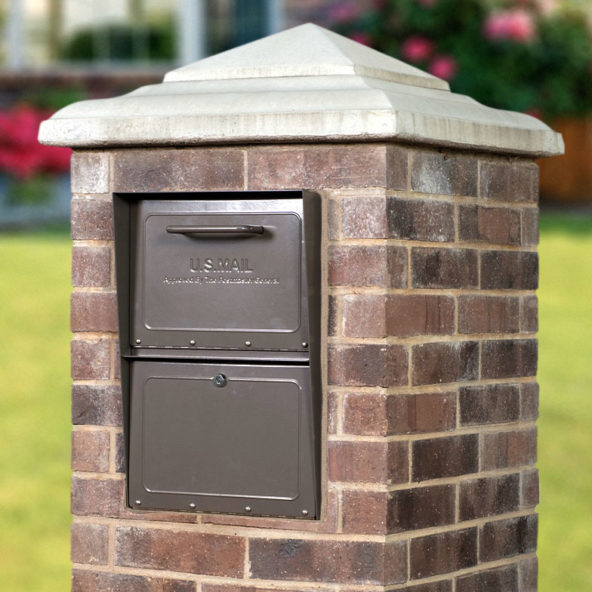 Bronze locking mailbox installed in brick