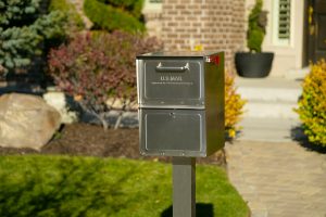 Stainless Steel Mail Box installed with post, zoomed out.
